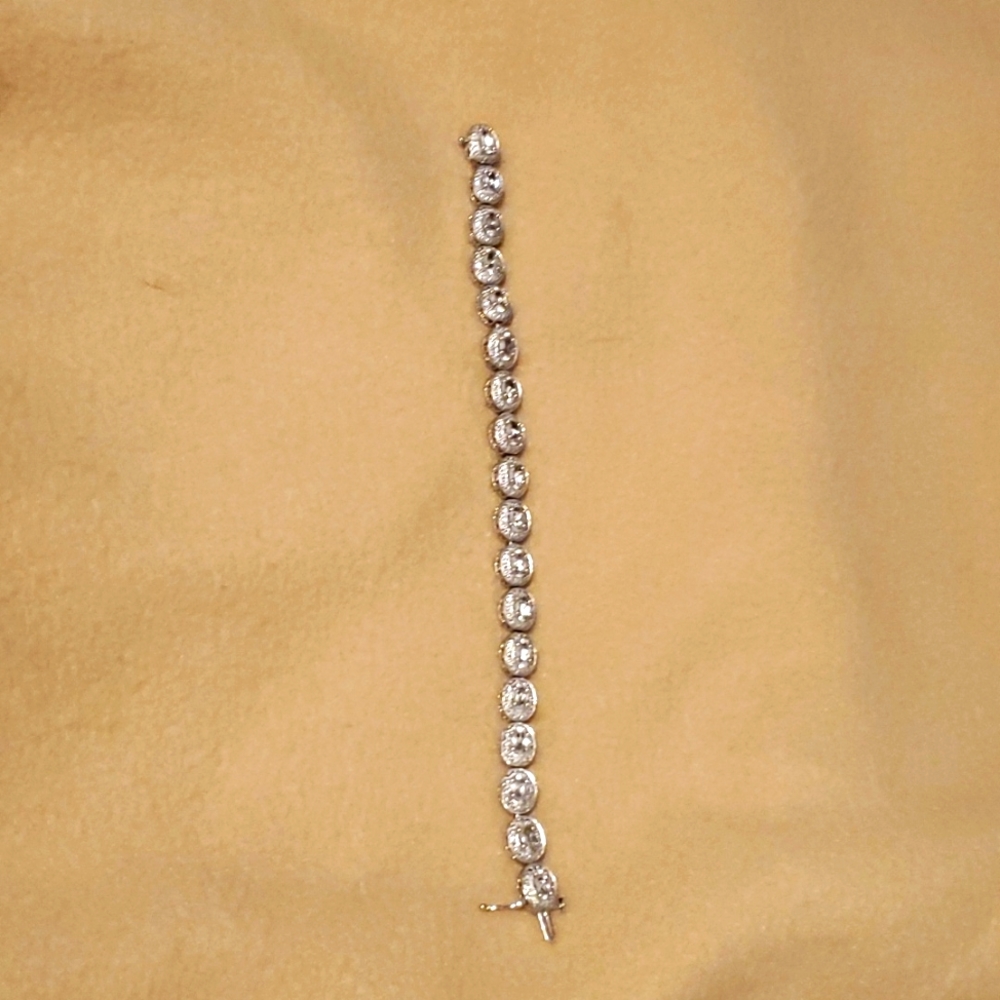 White sapphire and diamond accent bracelet